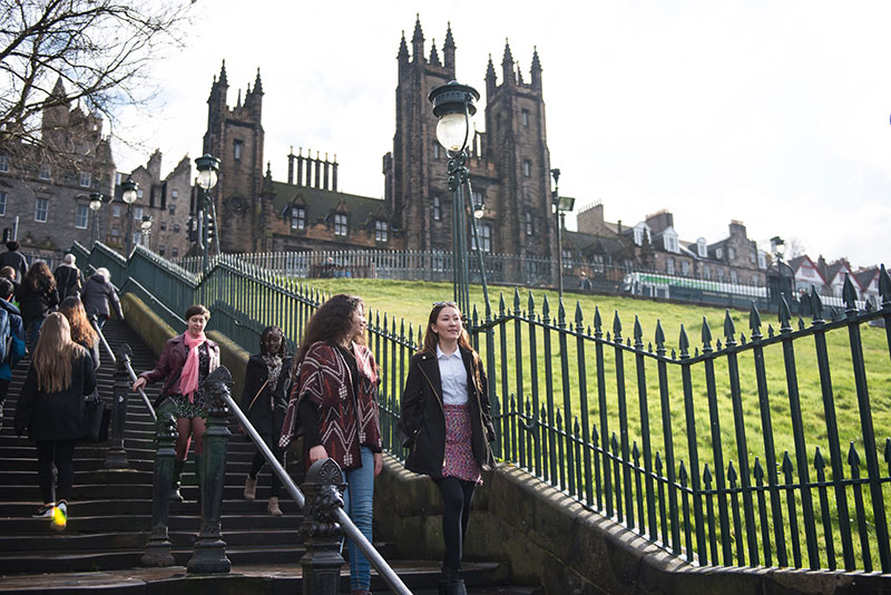 Pedestrians walking down the steps in Princes Street Gardens, Edinburgh city centre